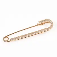 Brosa aurie tip ac de siguranta