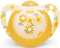 Suzeta din cauciuc Nuk - Star, peste 18 luni, galbena cu flori