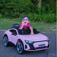 Masinuta electrica pentru copii Audi e-Tron GT Pink cu licenta,radiocomanda 2.4G,roti EVA,doua motoare,acumulator 12V,faruri si stopuri LED,acumulator 12V4,5Ah,doua motoare,oglinzi retrovizoare,unitate audio cu muzica