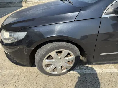 Aripa fata stanga culoare negru - lc9x Volkswagen Passat CC (2008-2012)