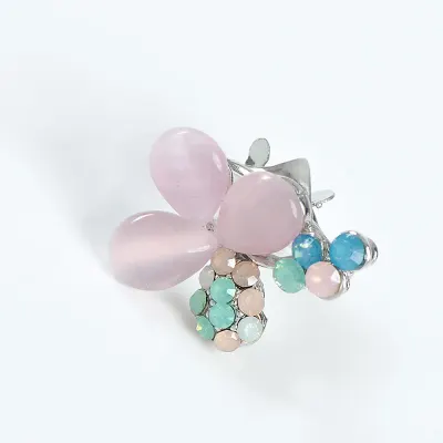 Brosa martisor floare roz cu pietre multicolore