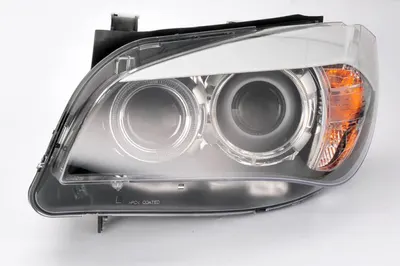 Far stanga (D1S, reglaj electric, cu motoras, cu lumini de zi) BMW X1 2009-2015