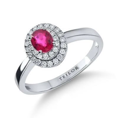 Inel din aur alb cu un rubin oval si diamante de 0.7ct