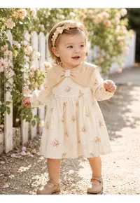 Rochie bebe fetita din muselina crem cu flori si bentita eleganta