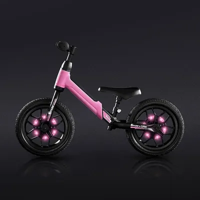 Bicicleta copii fara pedale Balance bike QPlay Spark Roz 12 inch, de la 3 ani pana la 30 kg, iluminare LED la roti, ghidon ajustabil cu mansoane anti-alunecare, sa ajustabila pe inaltime, roti de cauciuc
