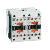 Ansamblu contactori pentru inversare de sens, AC bobina, interblocaj mecanic exterior cu auxiliar semnalizare , 25A AC3 IN AC, 12.5KW. bobina tensiune 230VAC 50/60HZ