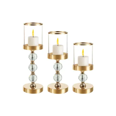 Set 3 sfesnice pentru lumanari, tip felinar, dimensiuni diferite, sticla, auriu/transparent