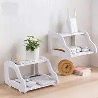 Suport de perete pentru router