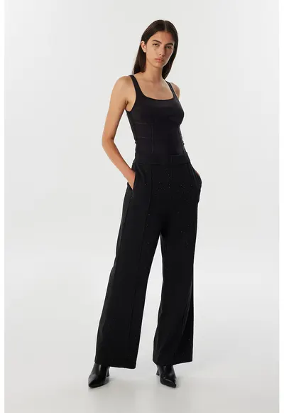 Pantaloni cu croiala ampla si aplicatii de strasuri - Negru